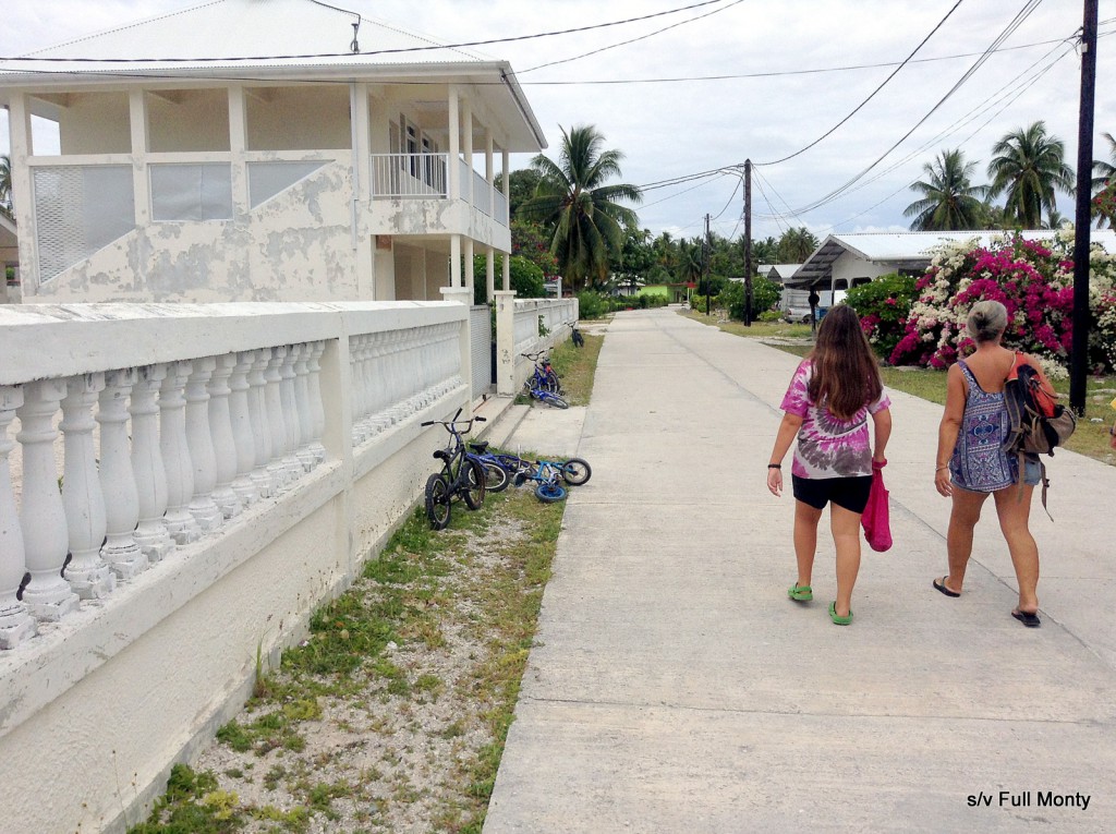 strolling past a school in the village of Tearavero, Kauehi
